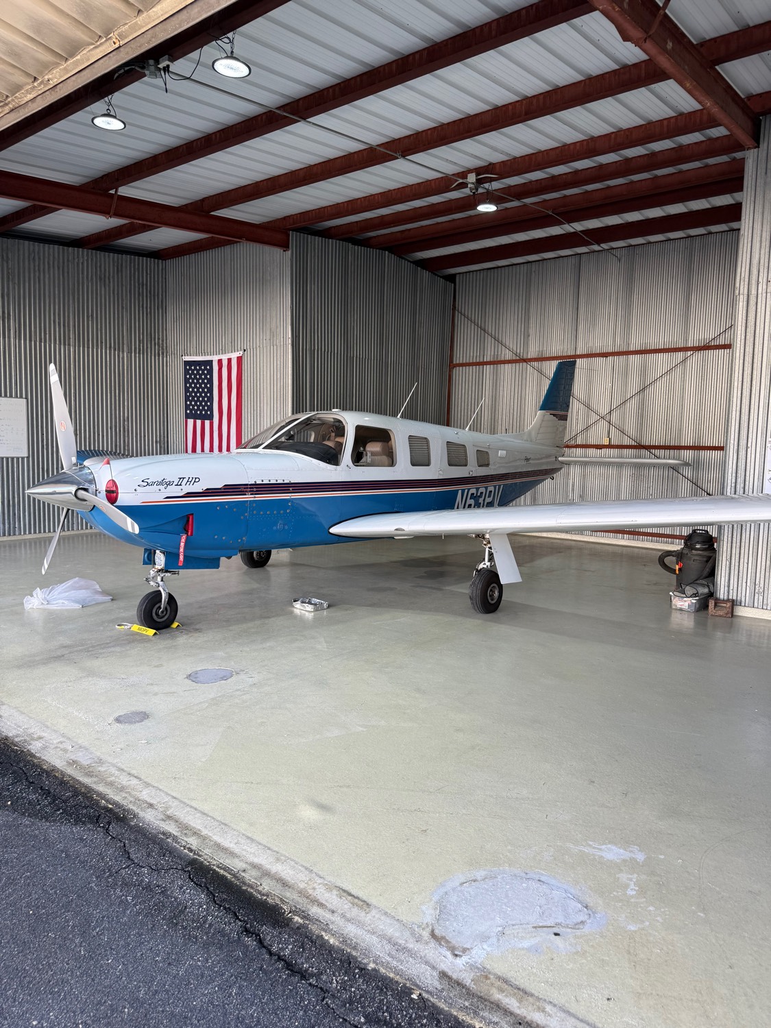The club's Saratoga inside the hangar